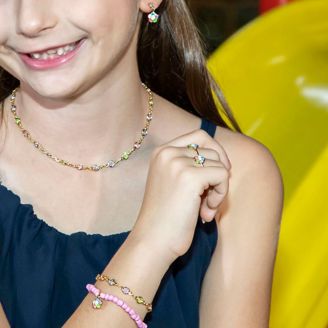 ANEL INFANTIL FLOR FELIZ RESINADA BANHADO A OURO