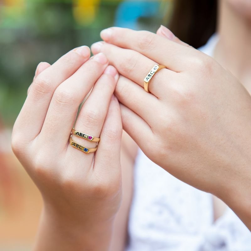 ANEL ABC COM ZIRCONIA ROSA - BANHADO EM OURO